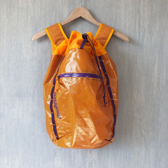 Patagonia Handbags - Patagonia lightweight black hole cinch pack orange
